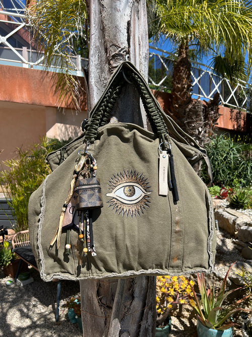 Grand sac toile kaki œil protecteur