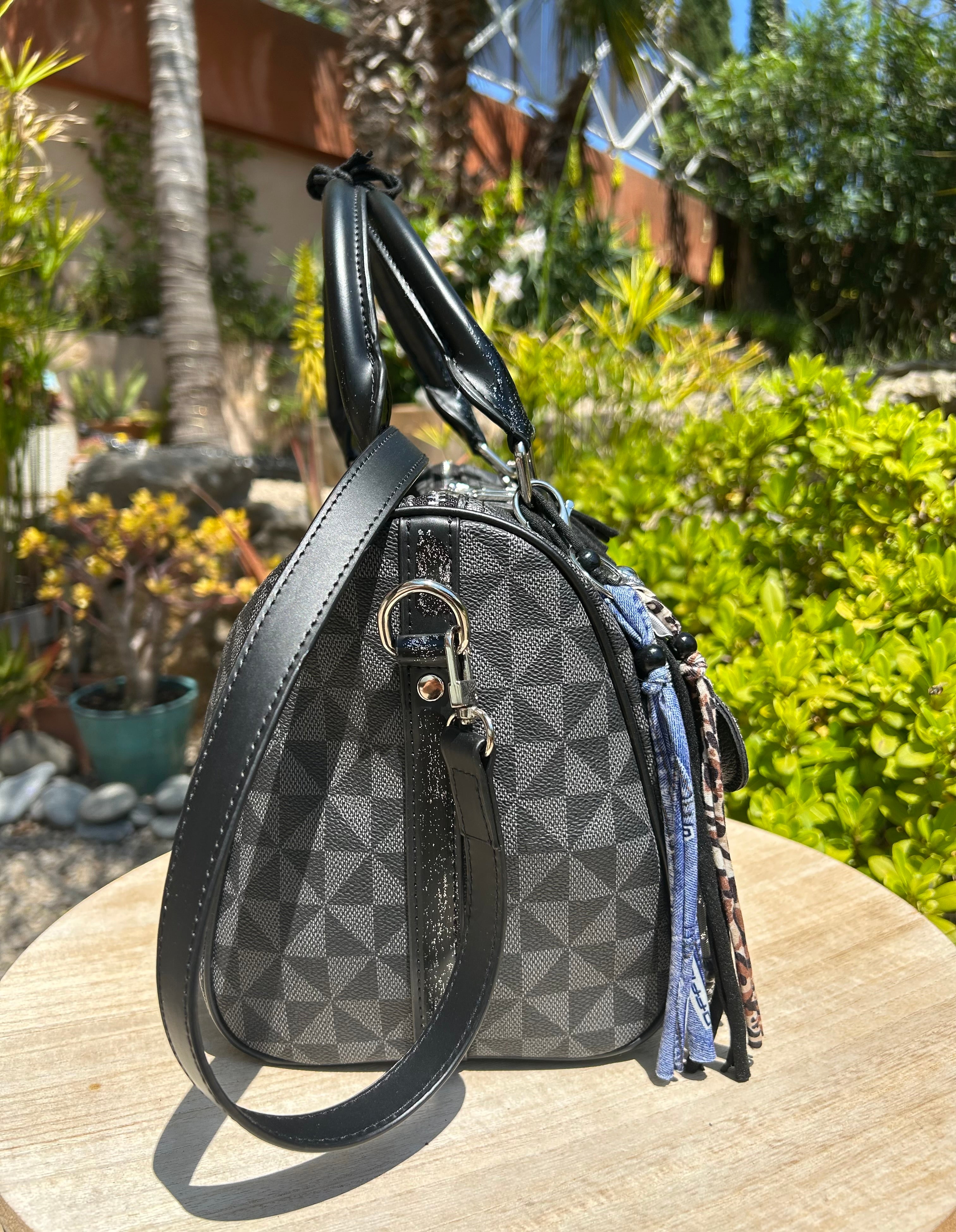 Sac Boston noir Dans Quel Monde Vitton