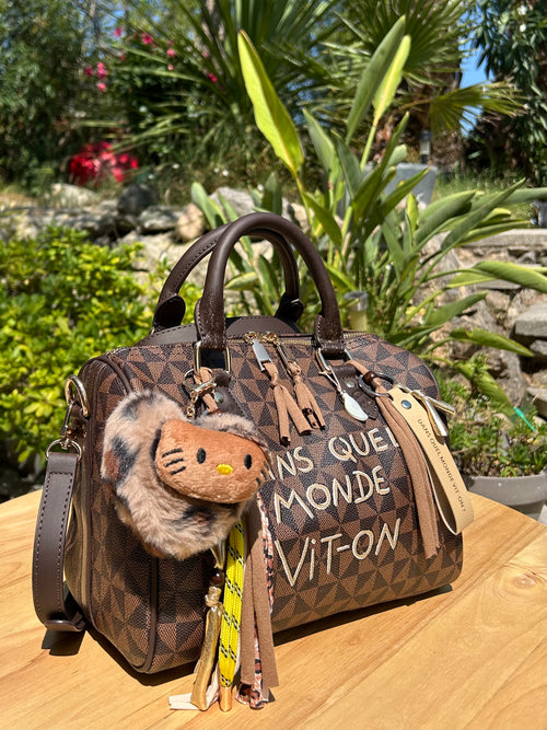 Sac Boston marron DANS QUEL MONDE VIT-ON