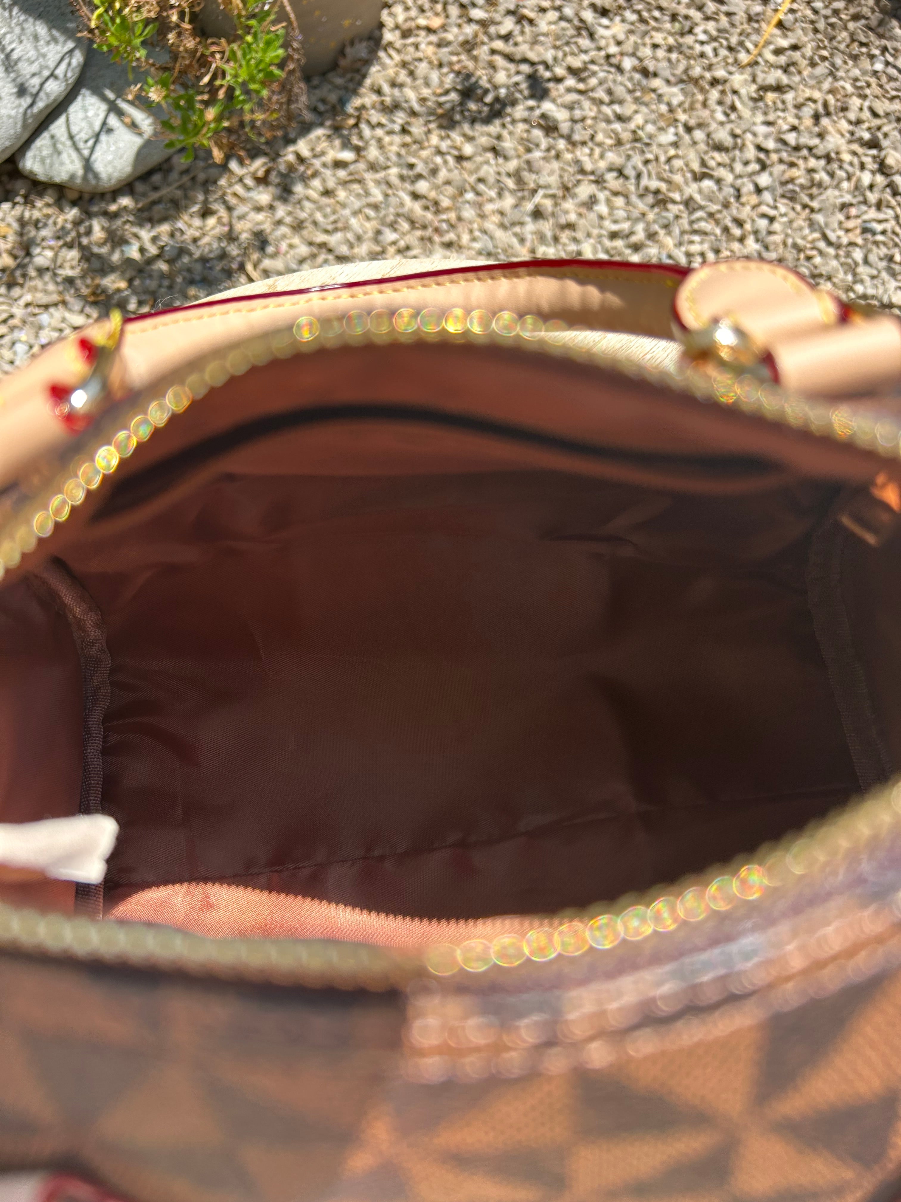 Sac Boston marron DANS QUEL MONDE VIT-ON
