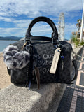 Sac Boston noir DANS QUEL MONDE VIT-ON !