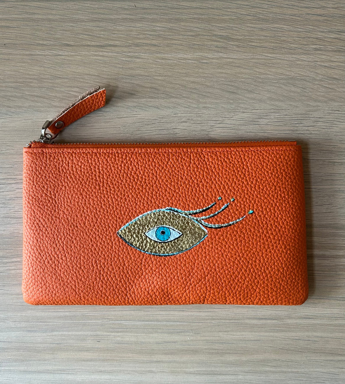 Pochette cuir orange  - Œil