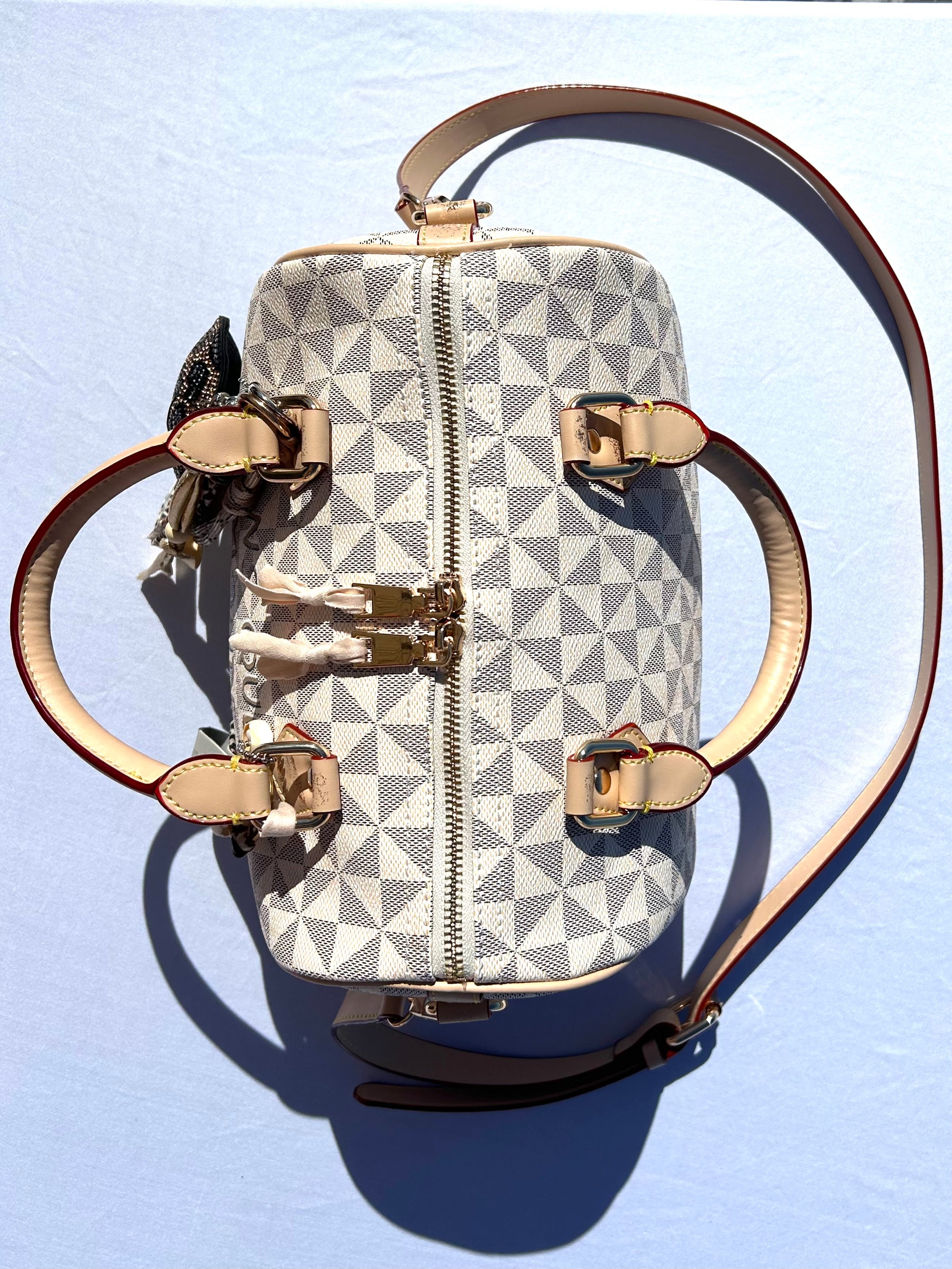 Sac Boston crème DQMV
