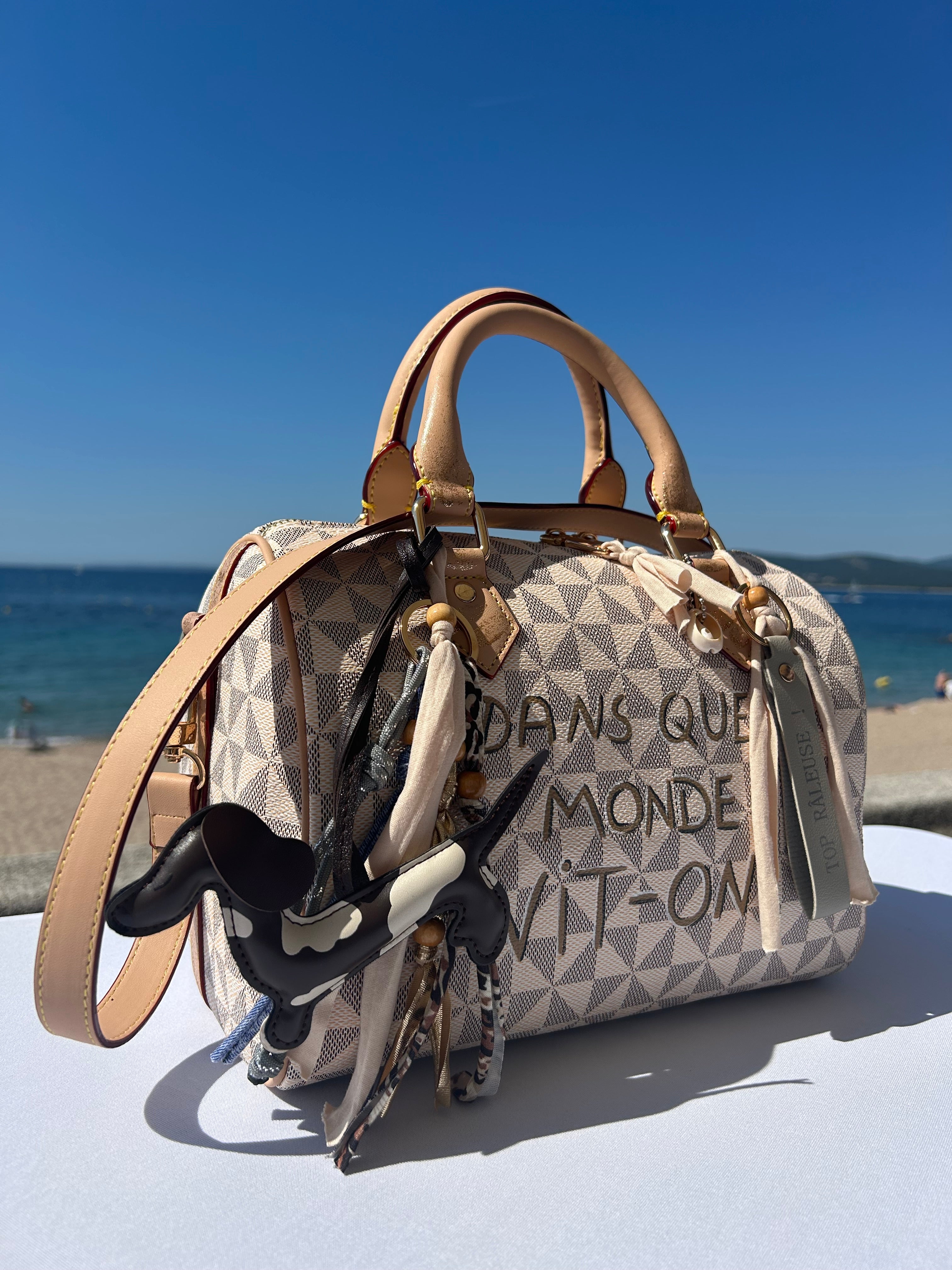 Sac Boston DANS QUEL MONDE VIT-ON