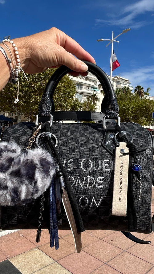 Sac Boston noir DANS QUEL MONDE VIT-ON !
