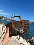 Mini sac « Dans quel monde Vitton »