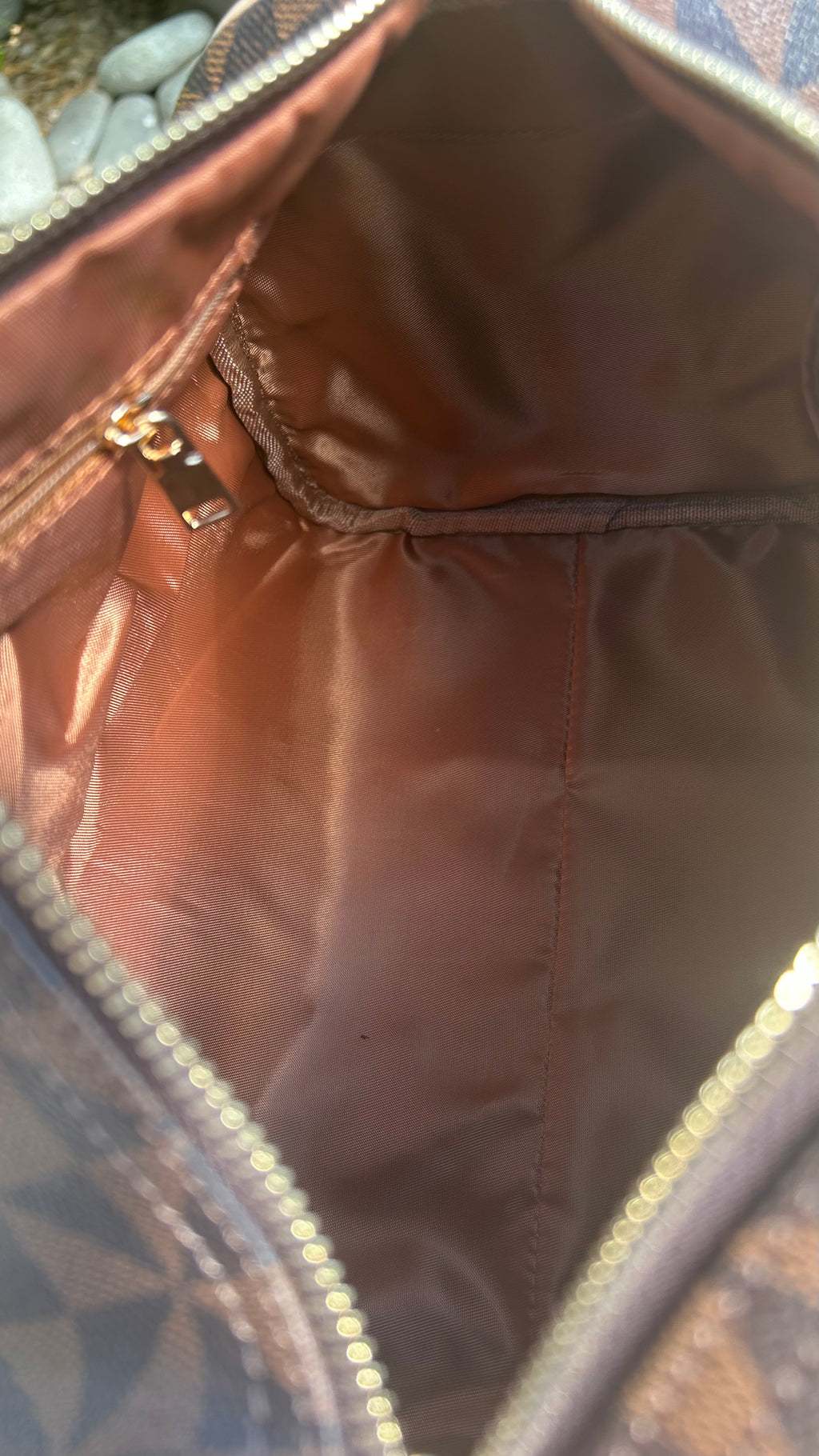 Sac Boston marron Dans quel monde Vit-on