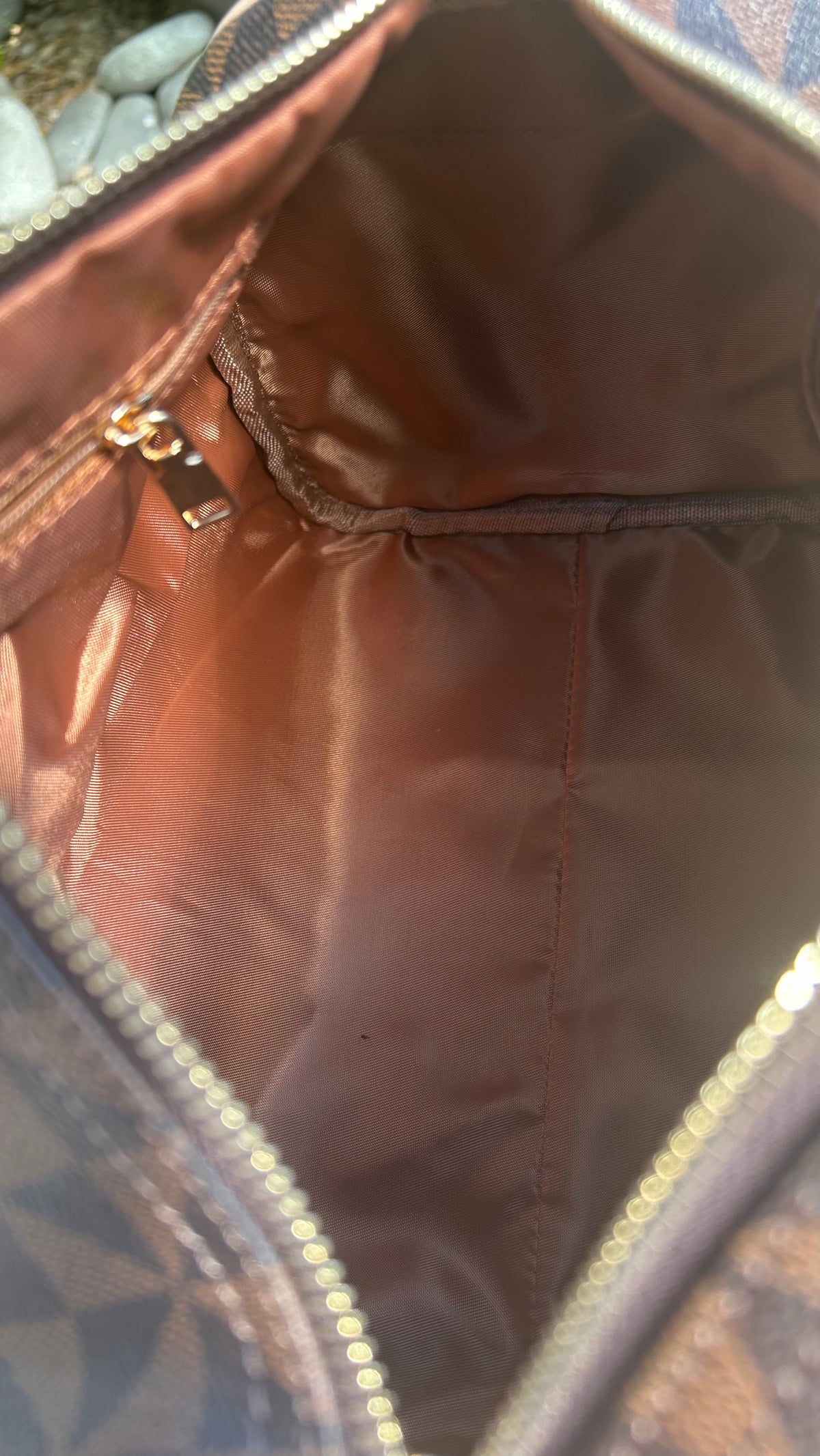 Sac Boston marron Dans quel monde Vit-on