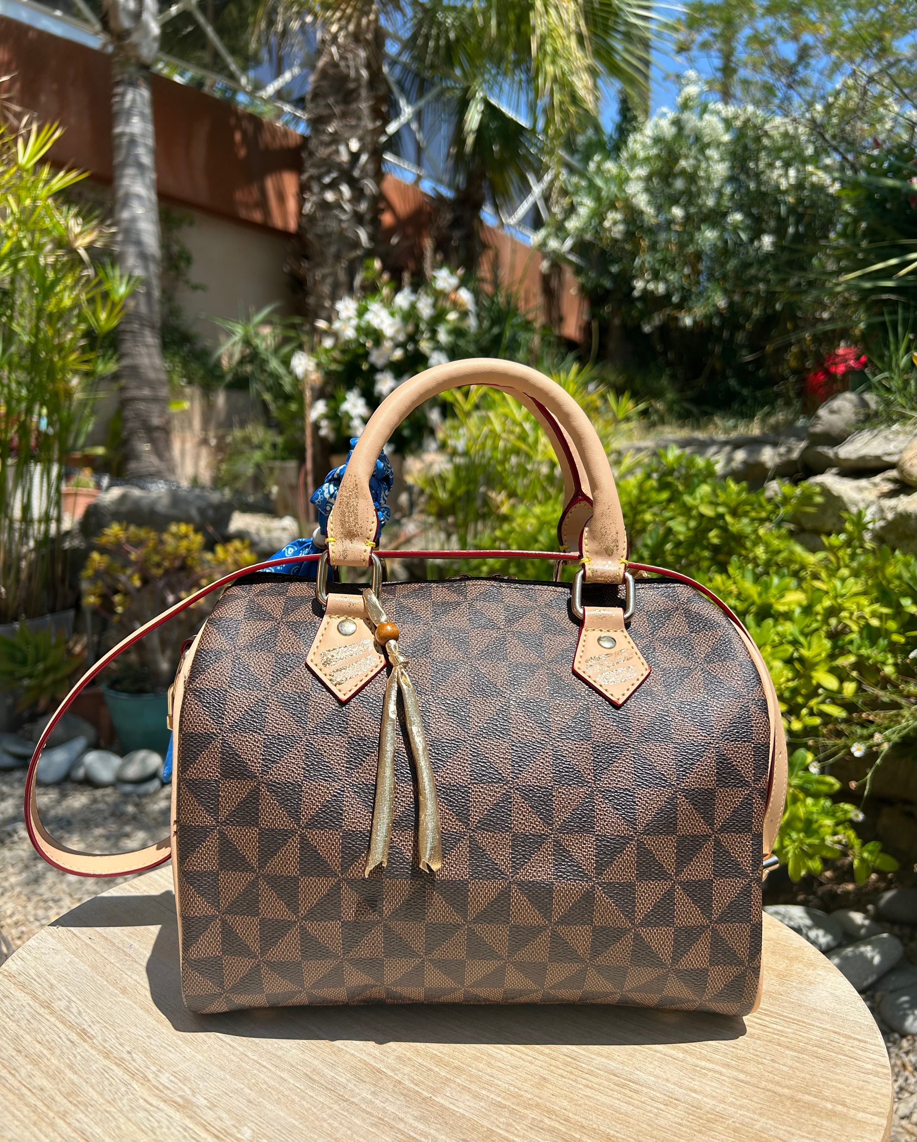 Sac Boston marron DANS QUEL MONDE VIT-ON