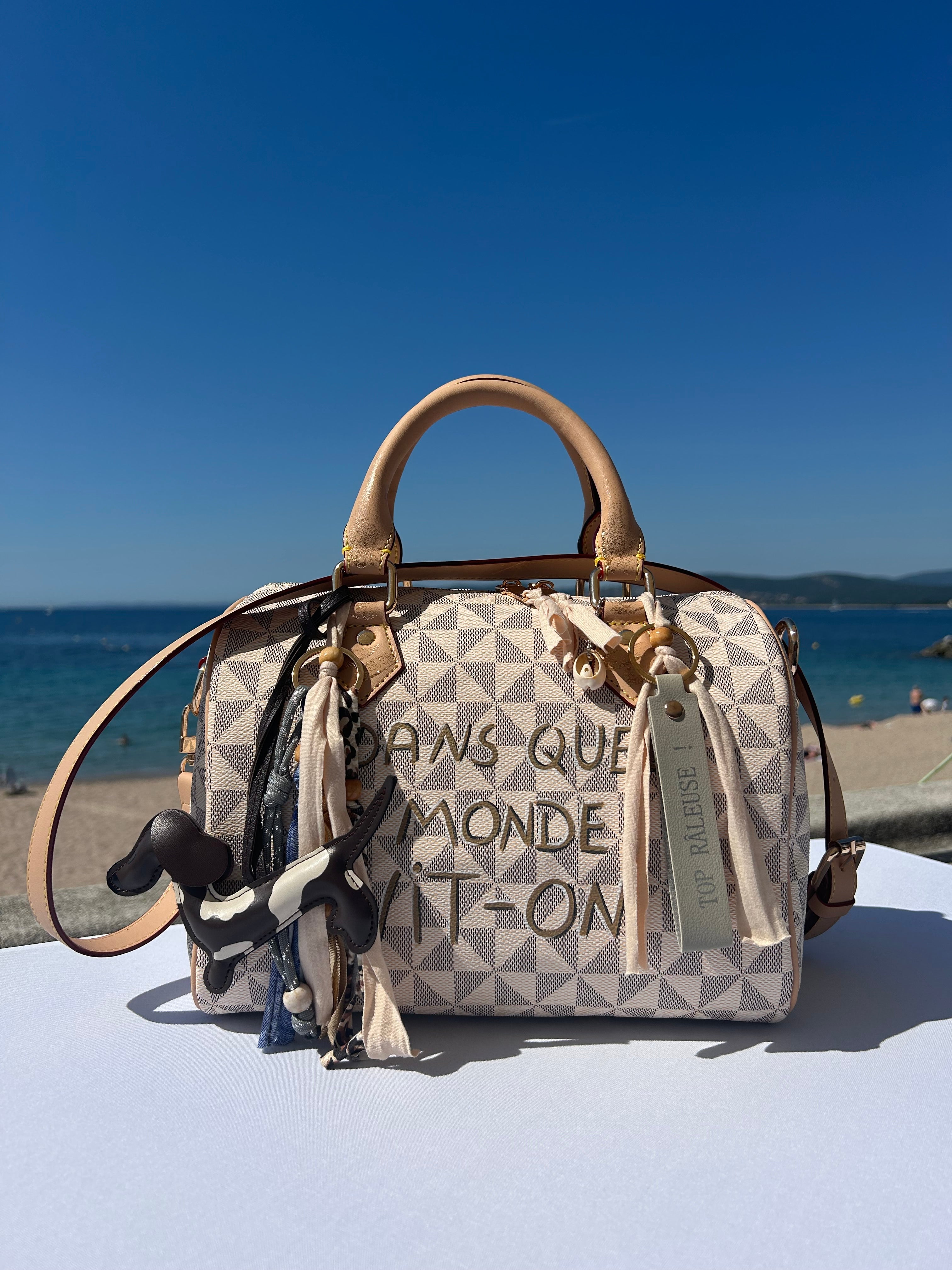 Sac Boston DANS QUEL MONDE VIT-ON