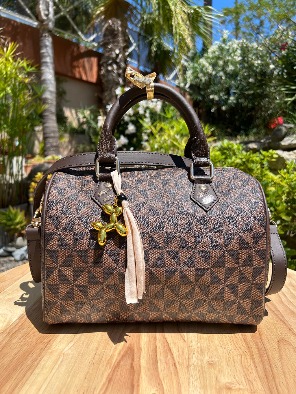 Sac Boston marron fleur dorée