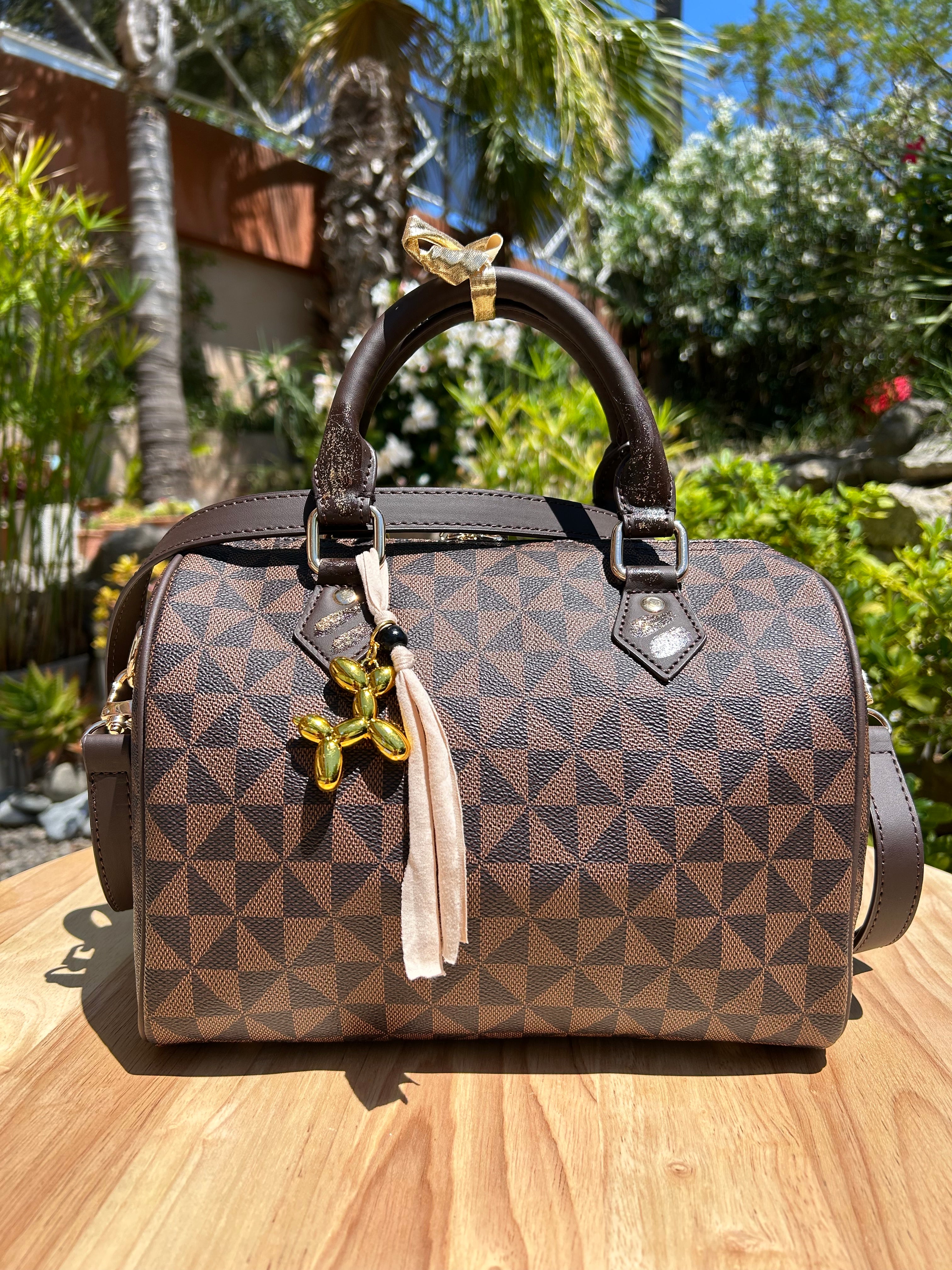 Sac Boston marron fleur dorée