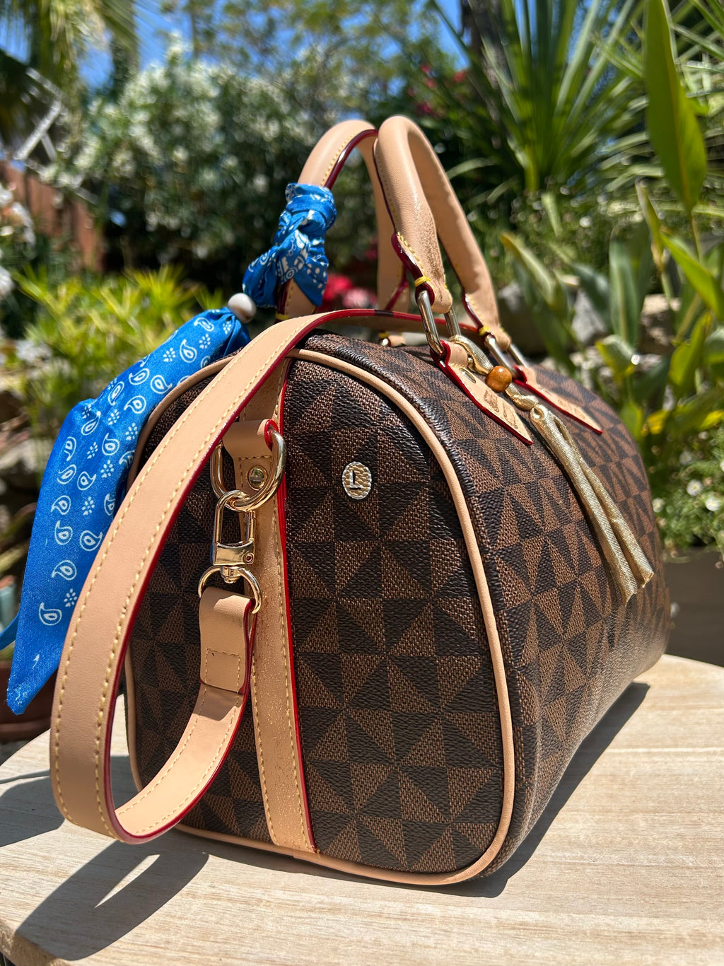 Sac Boston marron DANS QUEL MONDE VIT-ON