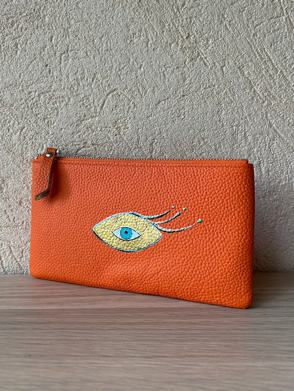 Pochette cuir orange  - Œil