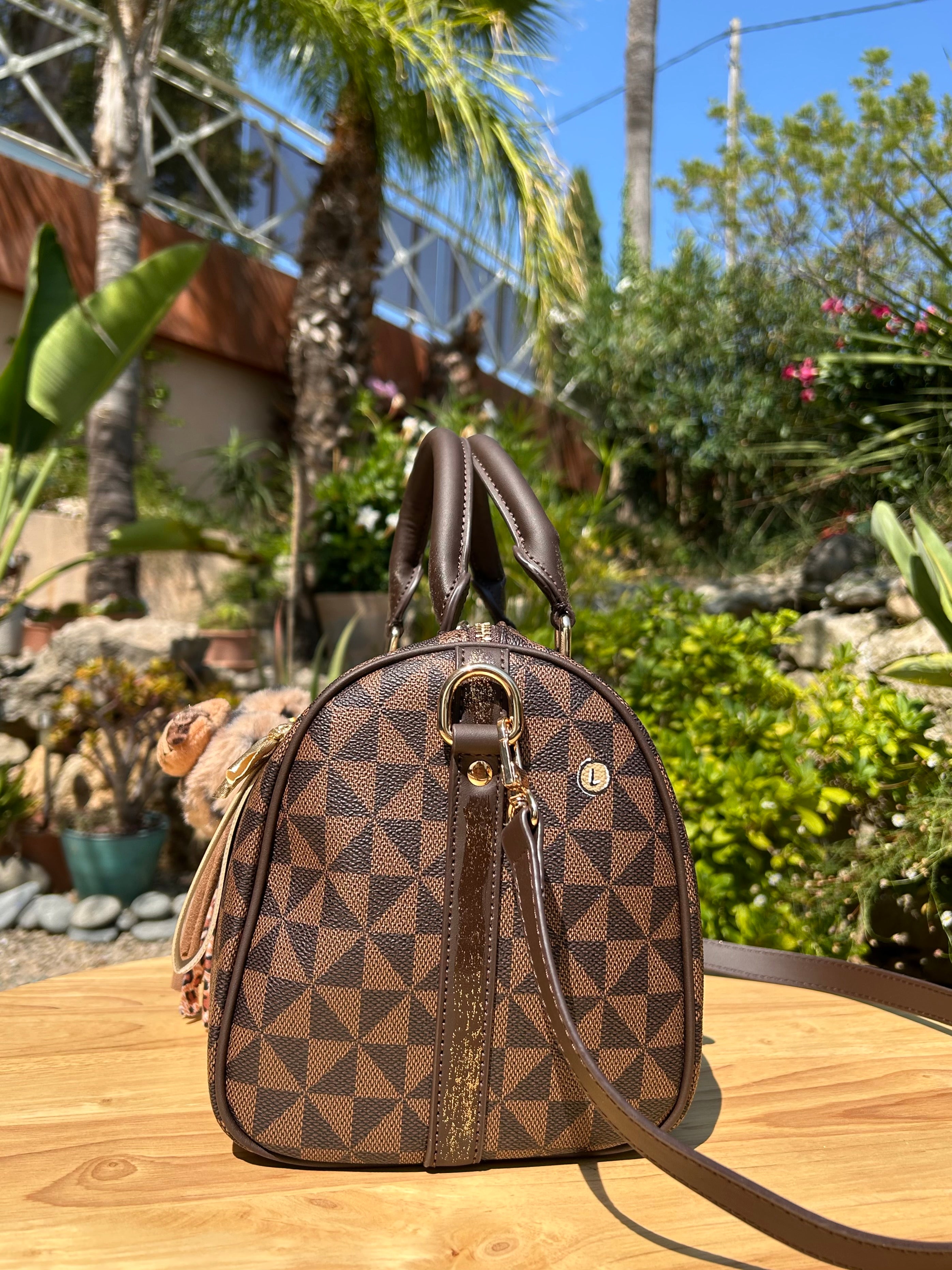 Sac Boston marron DANS QUEL MONDE VIT-ON