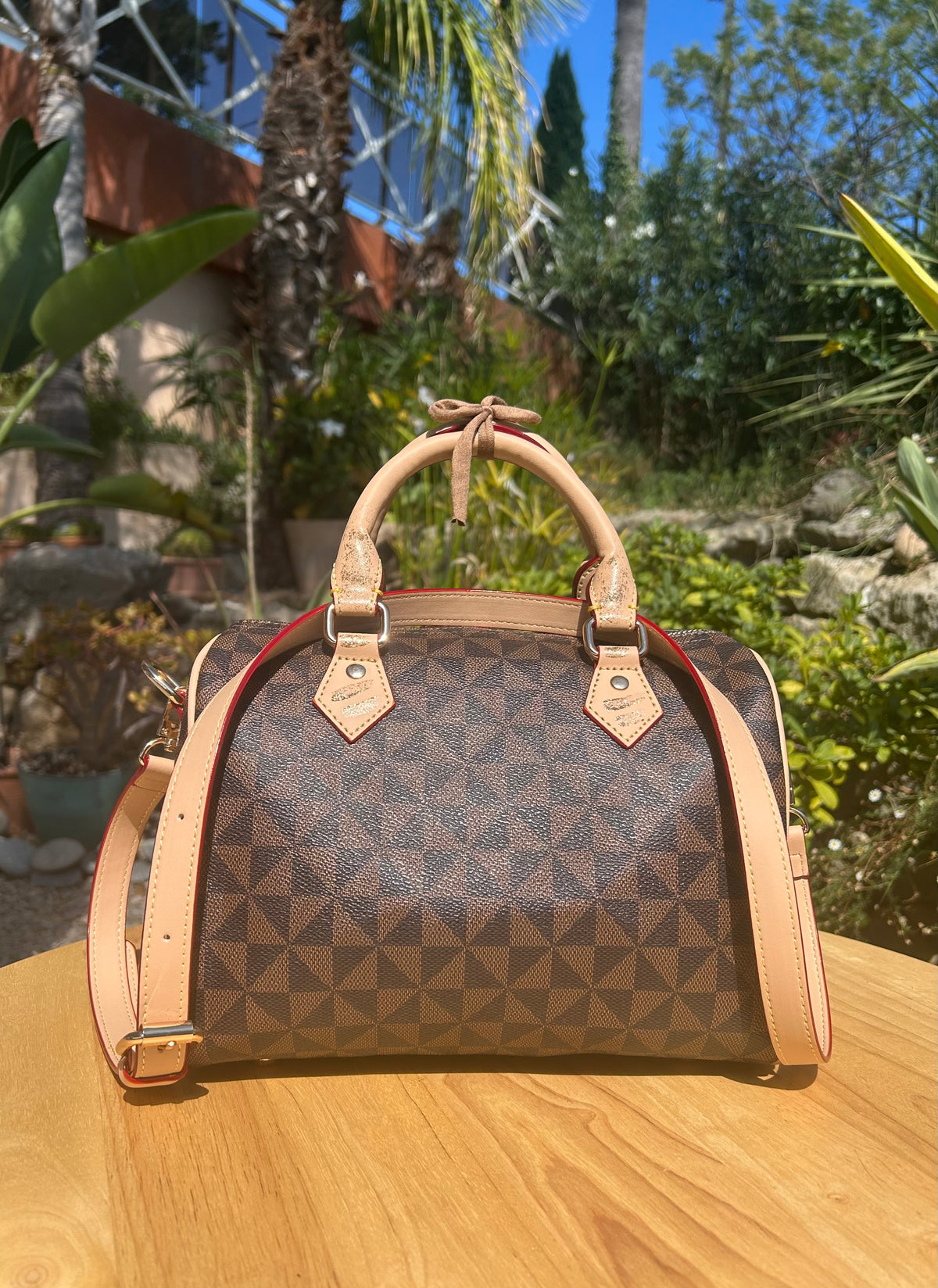 Sac Boston marron Dans quel monde Vit-on