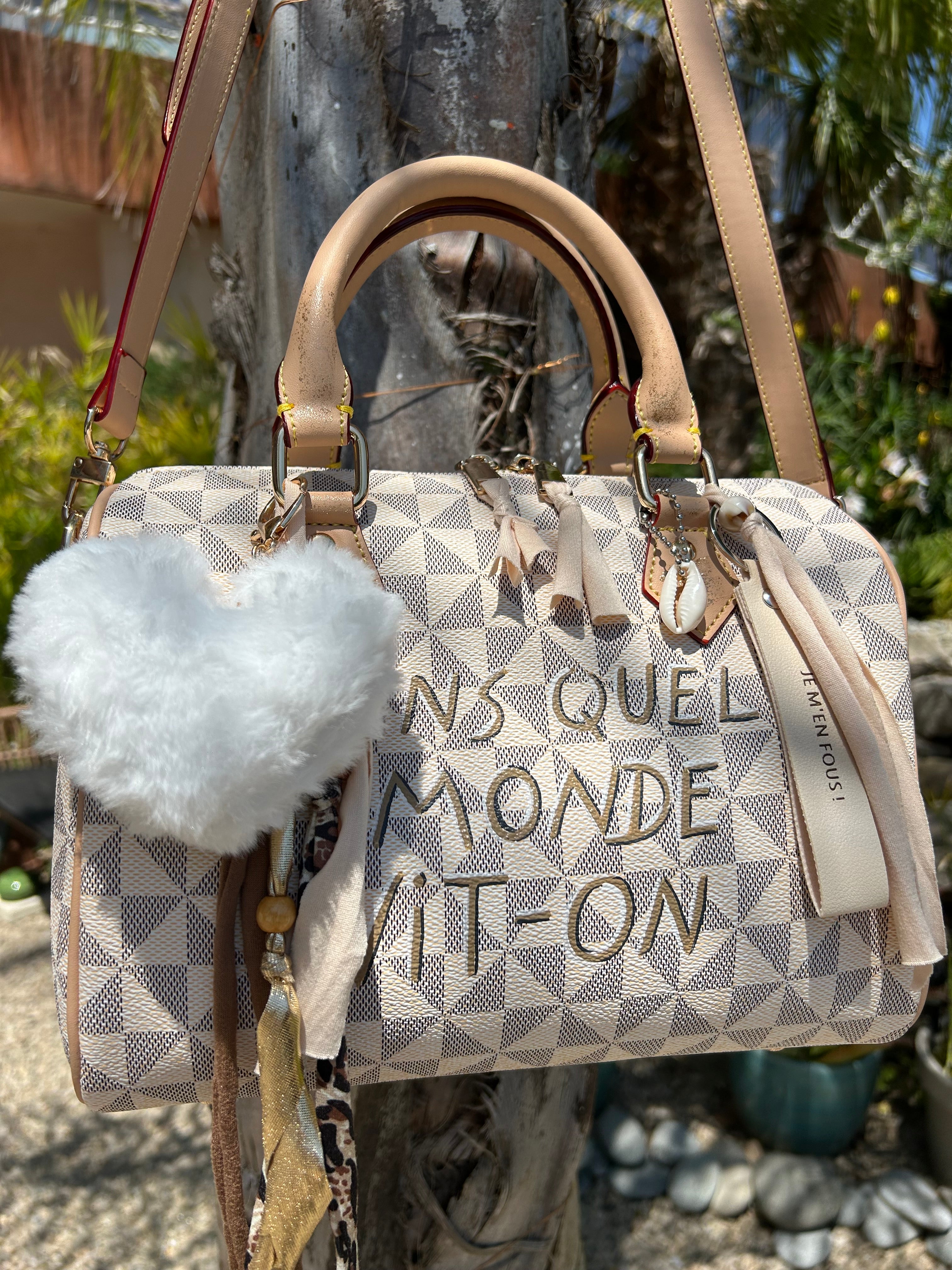 Sac Boston DANS QUEL MONDE VIT-ON !